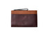 Handmade leather portfolio bag for women, featuring a secure zipper for practical organization.