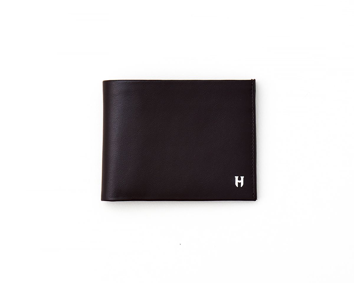 Long lasting Tanner wallet built to securely hold cards and bills with elegant design.