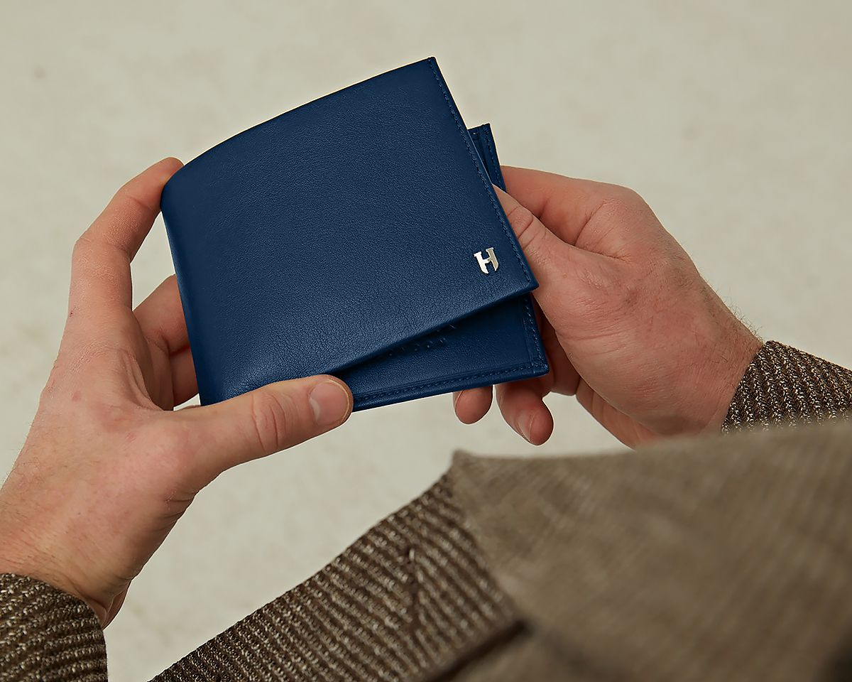 Stylish and durable Tanner wallet built for everyday use with organized card and cash slots.