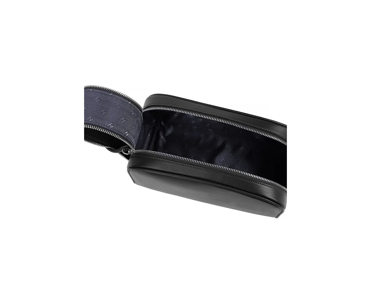 Durable handmade leather travel toiletry bag, perfect for organizing essentials on the go.