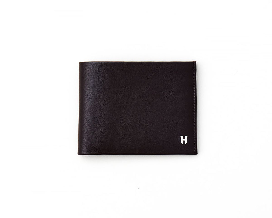 Long lasting Tanner wallet built to securely hold cards and bills with elegant design.